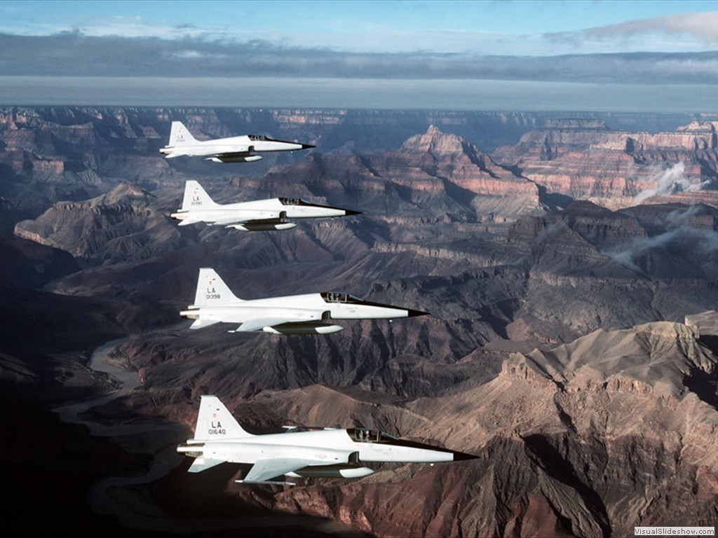 00  E-Tiger-II-fighters-from-the-58th-Tactical-Fighter-Wing-at-Luke-Air-Force-Base-Arizona-USA-flying-in-an-echelon-left-formation-over-the-Grand-Canyon